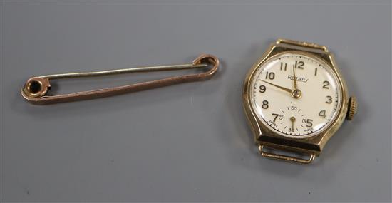 A ladys 9ct gold Rotary manual wind wrist watch (no strap) and a 9ct tie pin.